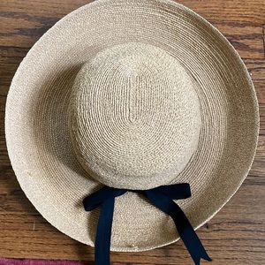 Straw hat with black ribbon. Annabel Ingall.